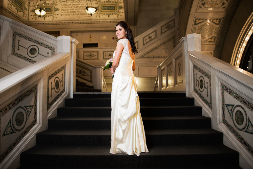 Bride standing on the staircase at the chicago cultural center