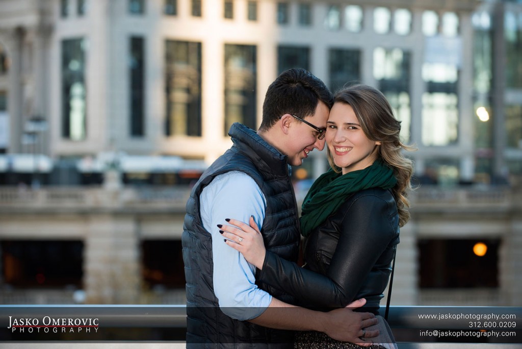 Couple close together for their engagement session.