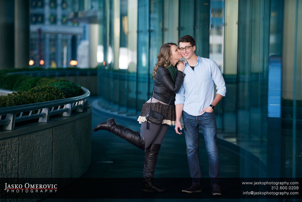 Engagement session of a couple near river walk in Chicago and Trump tower.