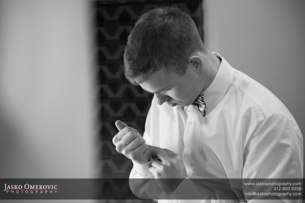Groom Getting Ready in the Blackstone hotel lounge in Chicago before his wedding