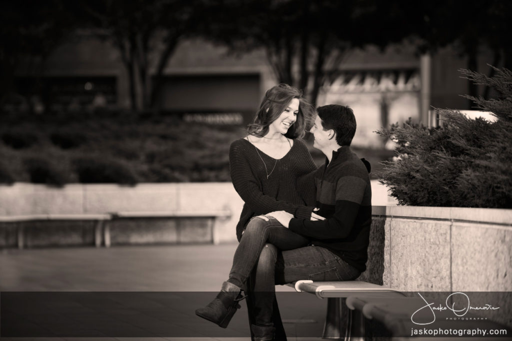 Engaged Couple Sitting On a Bench