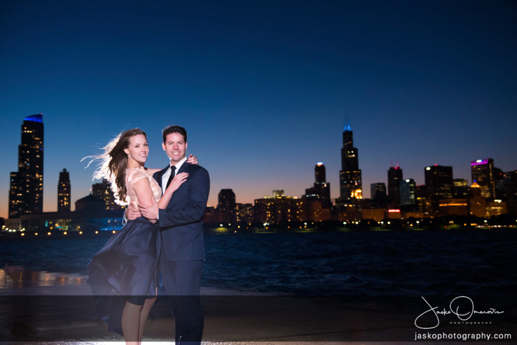 Engaged Couple Before Chicago Skyline