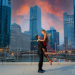 Engagement Session in Chicago Downtown with Groom Lifting the Bride