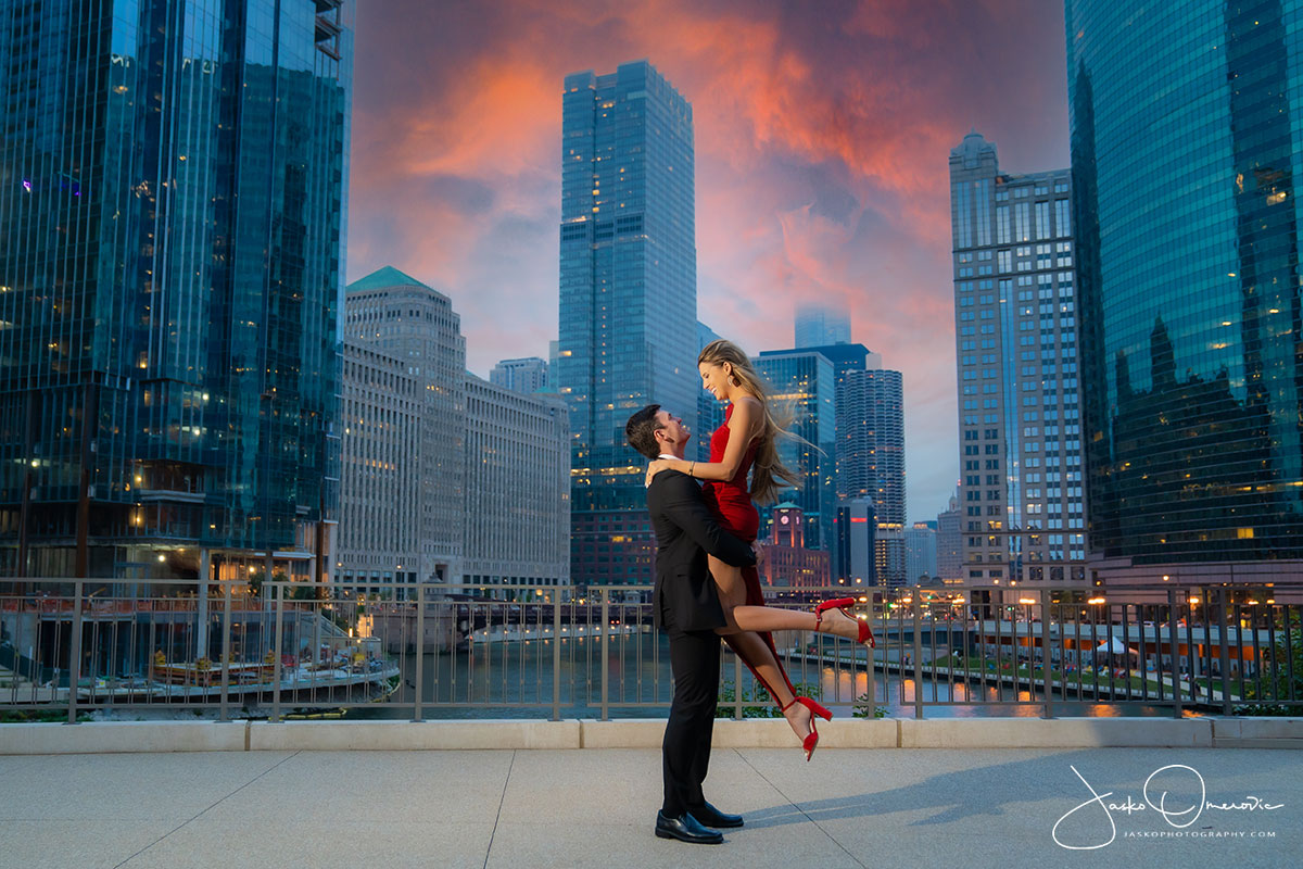 Engagement Session in Chicago Downtown with Groom Lifting the Bride