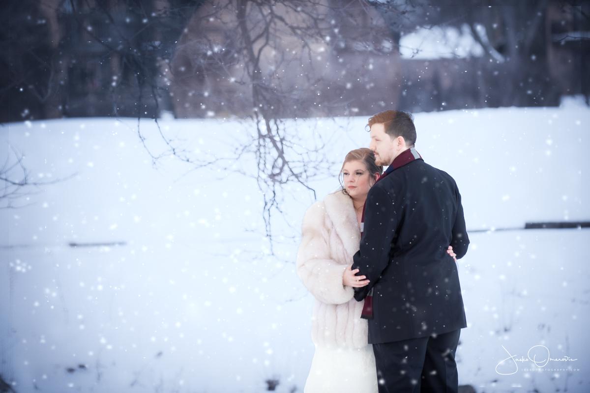 snow portrait of bride and groom
