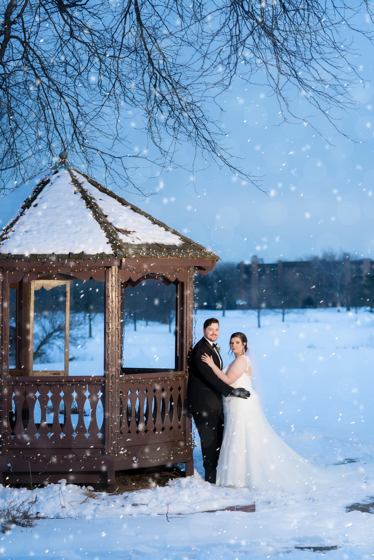 snowy photograph of bride and groom