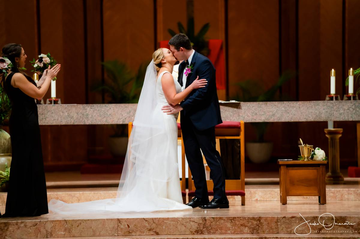 Bride and Groom Kissing at Chicago Wedding Church