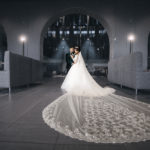 large bridal wedding veil with bride and groom