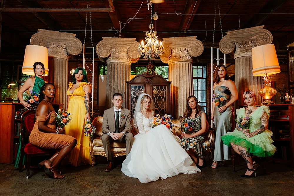 bridal party after wedding at an eclectic Chicago venue with a lot of rustic and vintage details