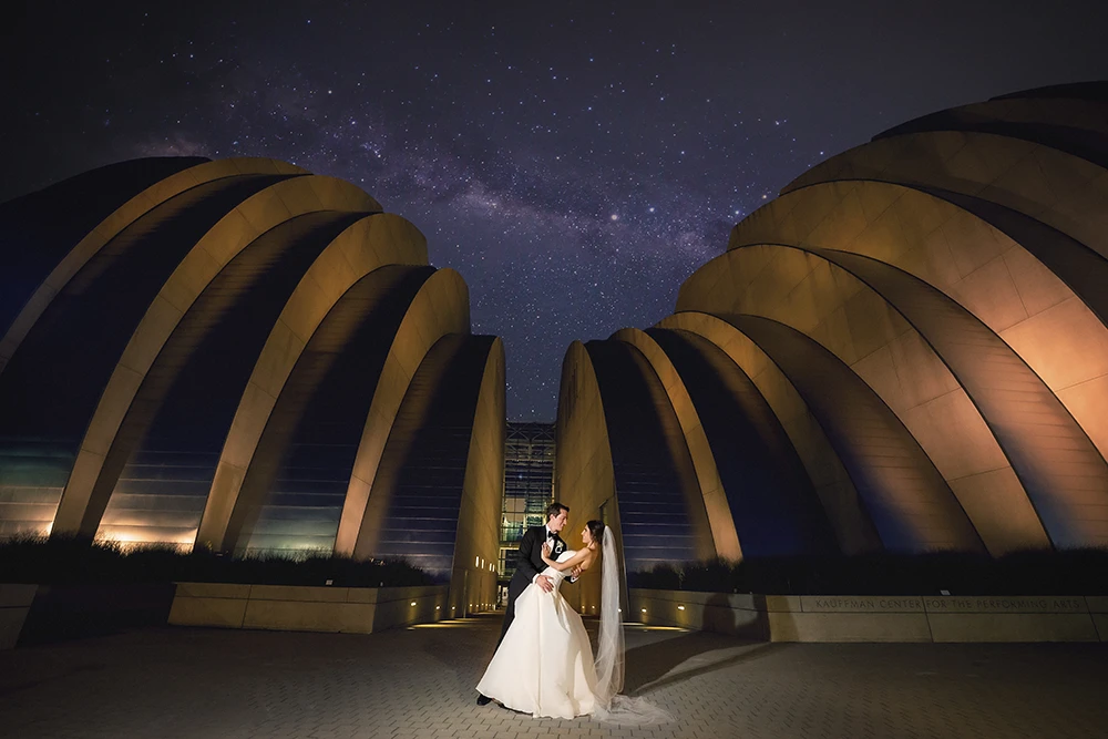Wedding couple framed by architectural lines at a modern Chicago venue