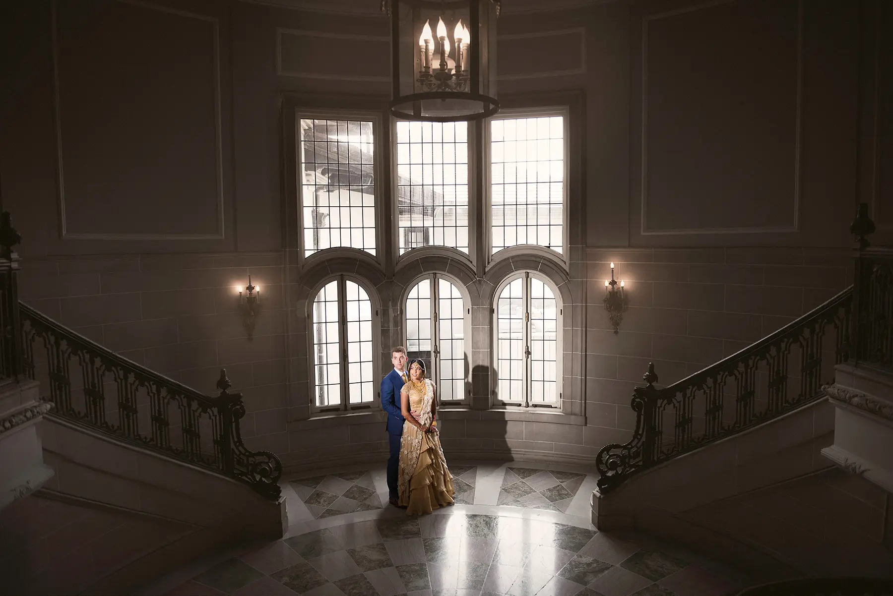 Bride and groom photographed inside Armour House in Lake Forest during their wedding, surrounded by historic estate architecture and natural light