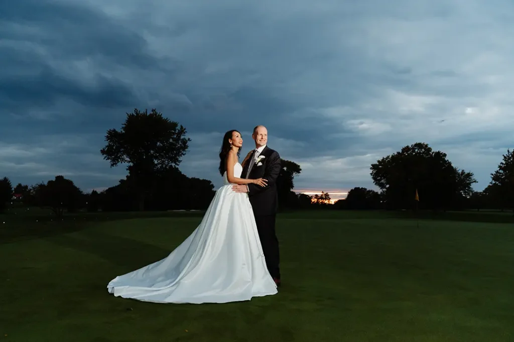 golden hour wedding portrait at sunset ridge club